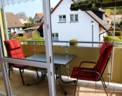 Balkon und Innenansichten der Ferienwohnung Sunny 2 in Koserow