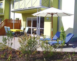 Terrasse und Innenansichten der Ferienwohnung Sunny 1 in Koserow