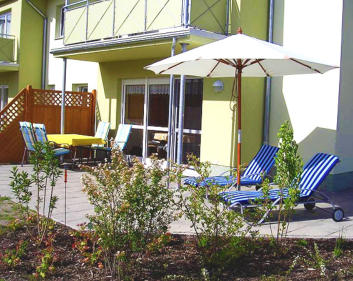 Terrasse und Innenansichten der Ferienwohnung Sunny 1 in Koserow